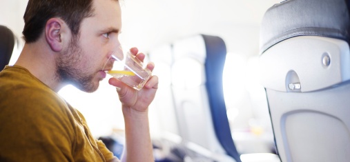 man sitting on commercial plane