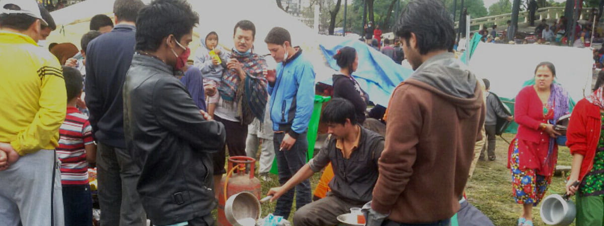 Nepal earthquake people eating on the street